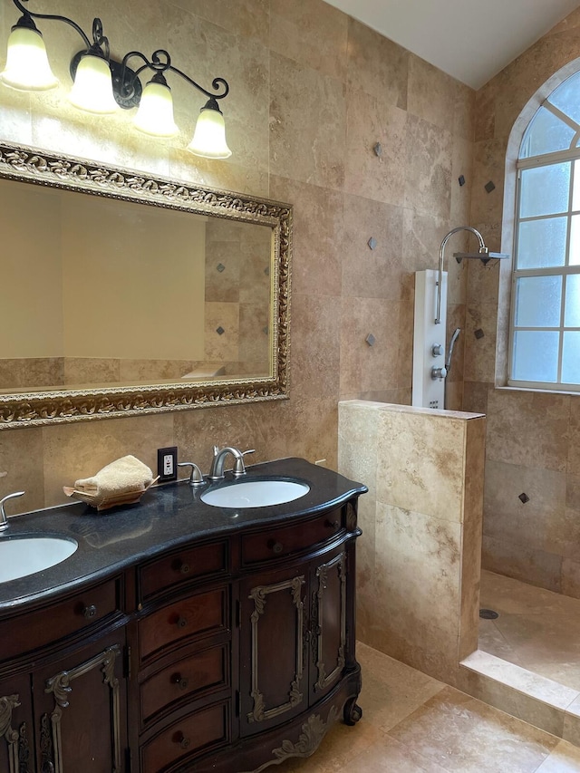 bathroom featuring tile walls, a shower, backsplash, and vanity