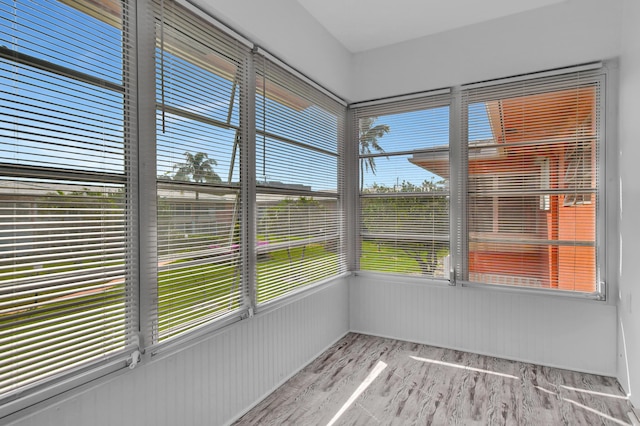 unfurnished sunroom featuring a healthy amount of sunlight