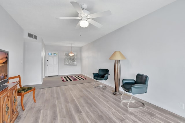 entryway featuring light hardwood / wood-style floors and ceiling fan