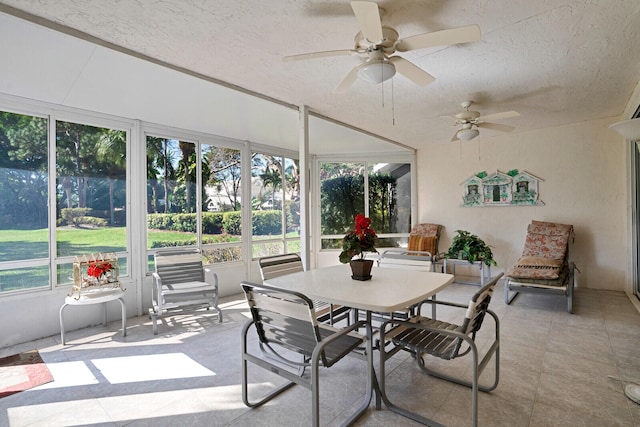 sunroom / solarium with ceiling fan