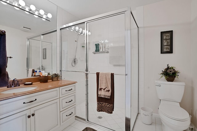 bathroom with a shower with door, tile floors, toilet, and vanity