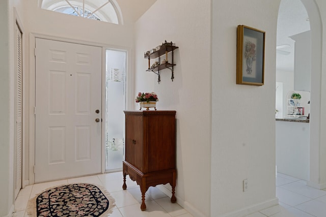 foyer entrance featuring light tile flooring