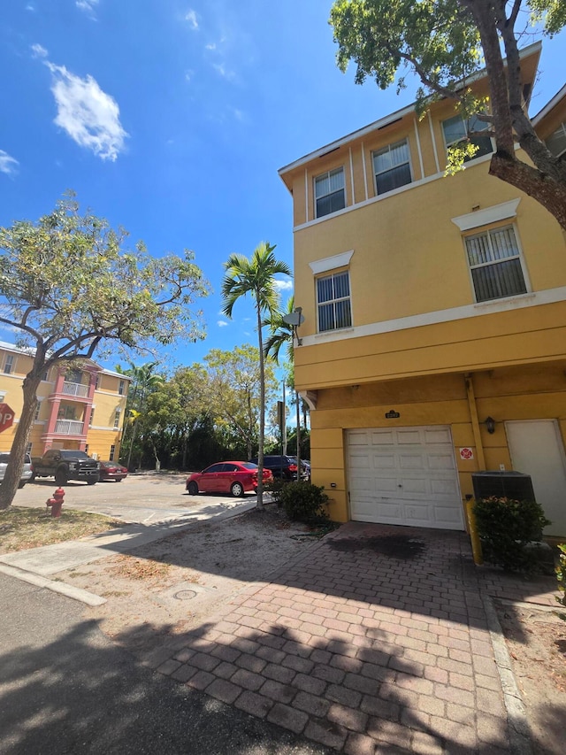 view of home's exterior with a garage