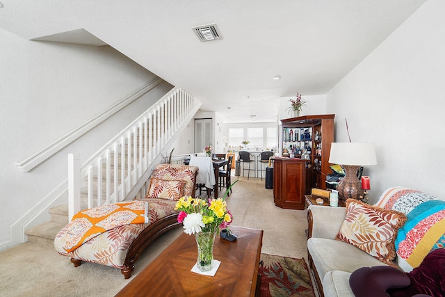 living room with light carpet