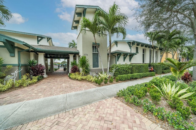 exterior space featuring a carport