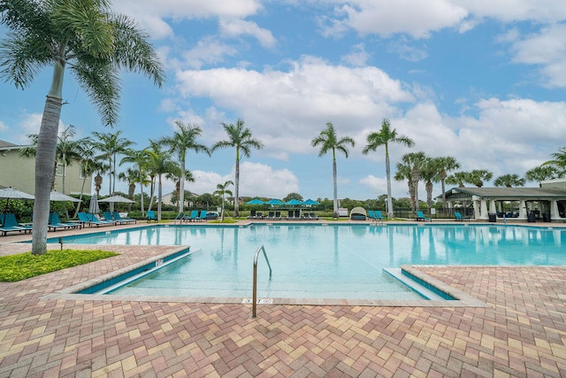 view of swimming pool featuring a patio area