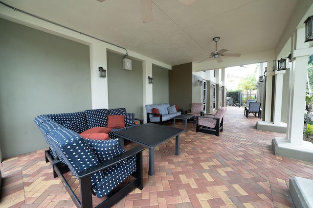 view of patio / terrace featuring an outdoor living space and ceiling fan