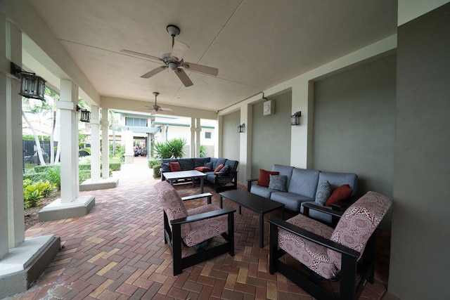 view of patio featuring an outdoor living space and ceiling fan