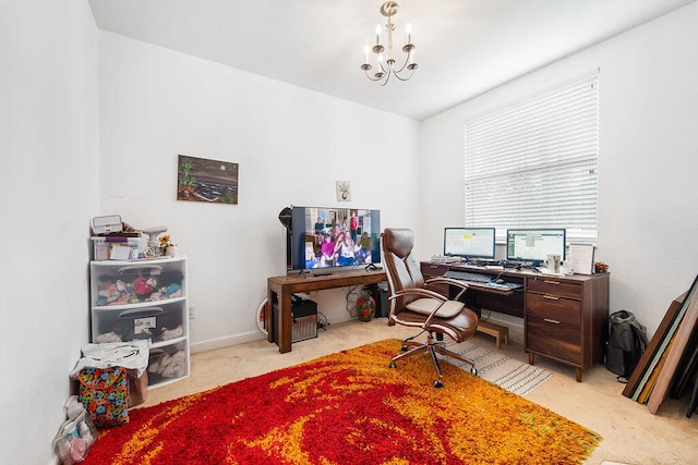 carpeted office space with an inviting chandelier