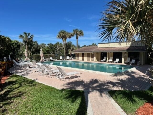 view of swimming pool featuring a patio area