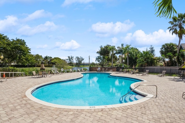 view of pool featuring a patio