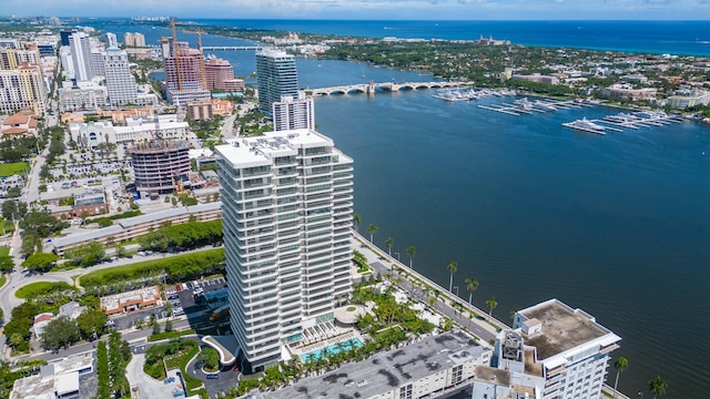 birds eye view of property with a water view