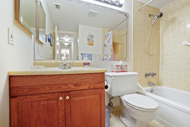 full bathroom with vanity, toilet, and shower / tub combo with curtain