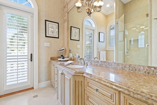 bathroom with vanity, a notable chandelier, a shower with door, tile flooring, and crown molding