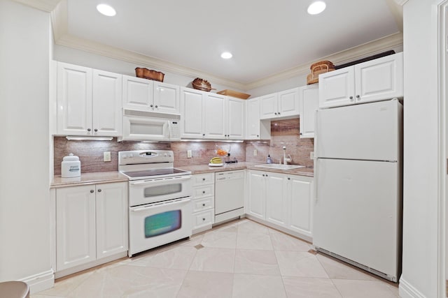 kitchen featuring white appliances, white cabinets, backsplash, and light tile floors