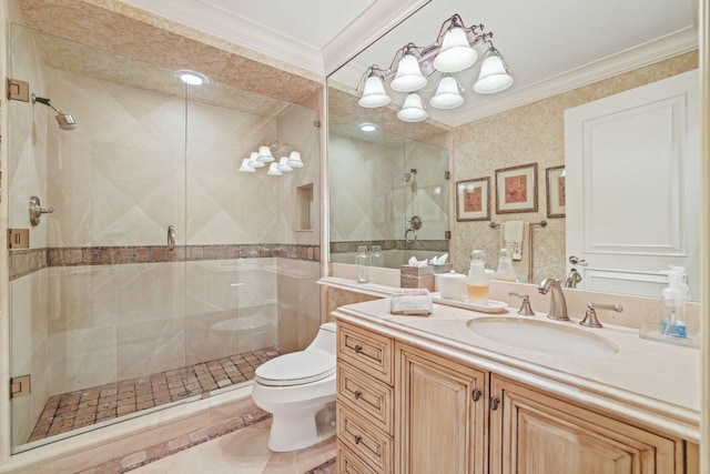 bathroom with toilet, ornamental molding, a shower with shower door, tile floors, and oversized vanity