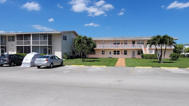 exterior space featuring a front yard