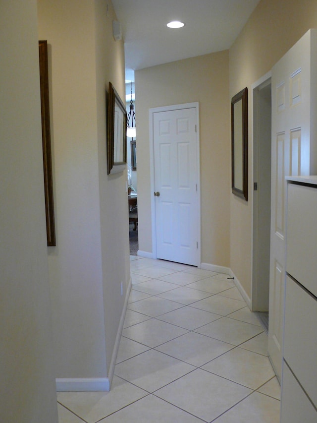 hallway with light tile flooring