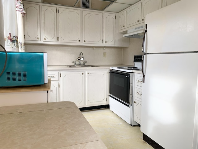 kitchen with white cabinetry, sink, and white appliances