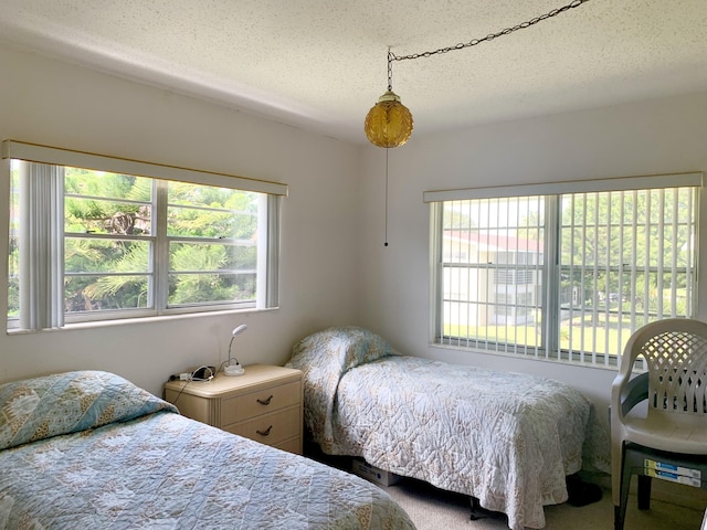 bedroom with a textured ceiling