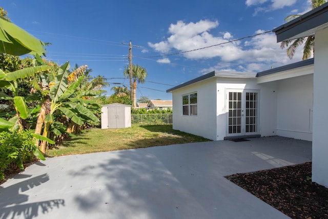 view of patio with a shed