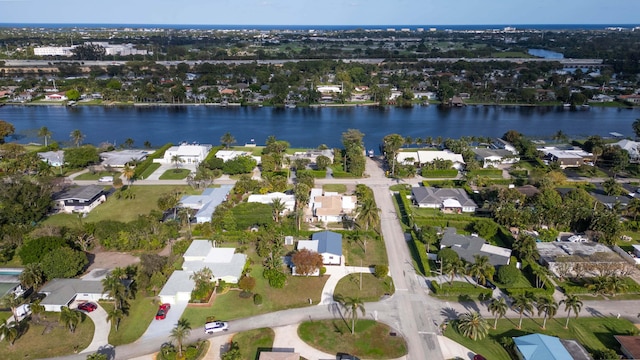 drone / aerial view with a water view