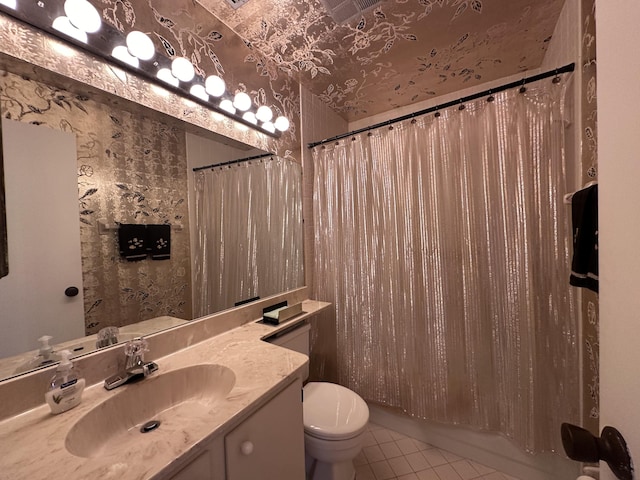 full bathroom with toilet, vanity, tile patterned floors, and shower / bath combination with curtain