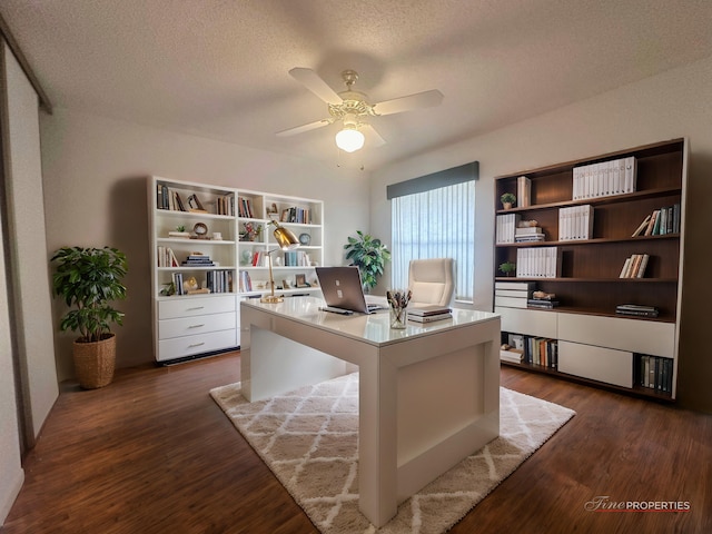 office with ceiling fan, a textured ceiling, and dark hardwood / wood-style flooring