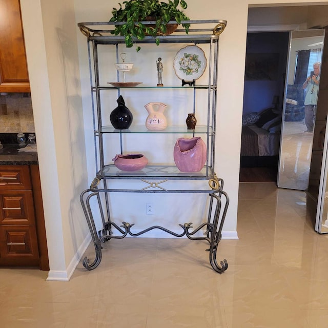 details featuring light tile flooring