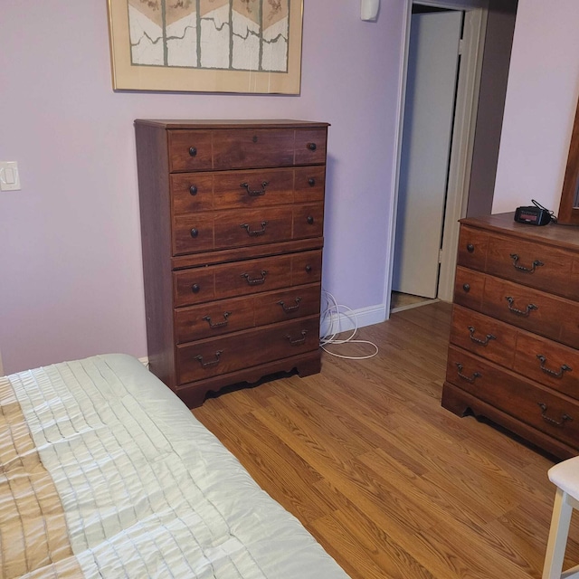 bedroom featuring hardwood / wood-style flooring