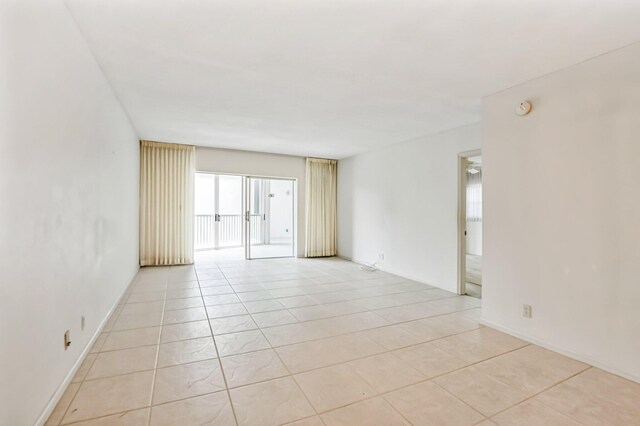 view of tiled spare room