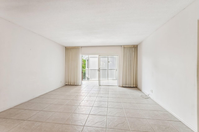 view of tiled spare room