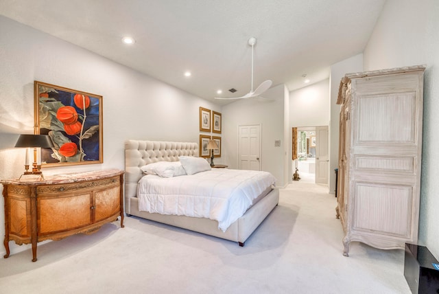 carpeted bedroom with vaulted ceiling