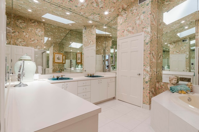 bathroom featuring dual sinks, tile flooring, a towering ceiling, a relaxing tiled bath, and large vanity