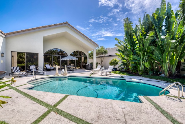 view of pool with a patio area