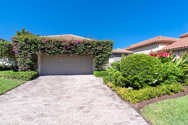 view of front of house with a garage