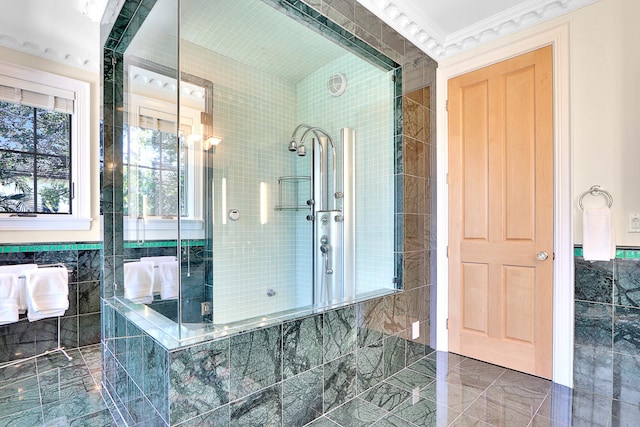 bathroom with tile walls, tile floors, shower with separate bathtub, and crown molding