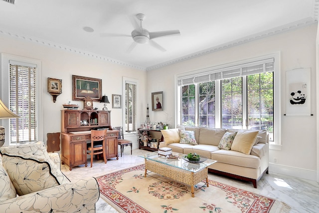 tiled living room featuring ceiling fan and crown molding