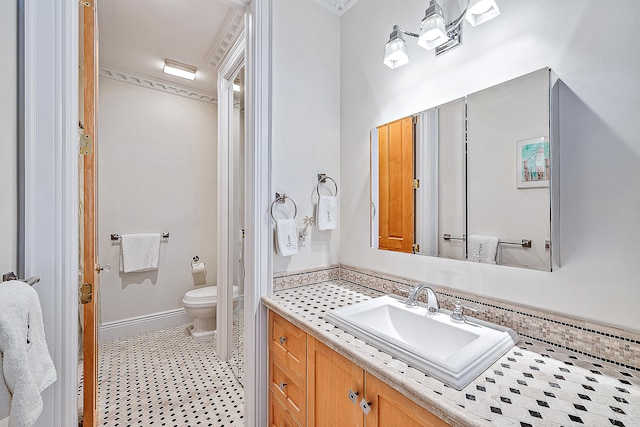 bathroom featuring oversized vanity, tile floors, and toilet