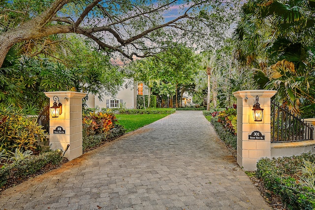 view of gate at dusk