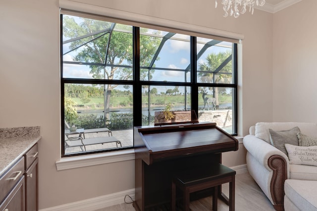 dining room with a healthy amount of sunlight and light hardwood / wood-style flooring