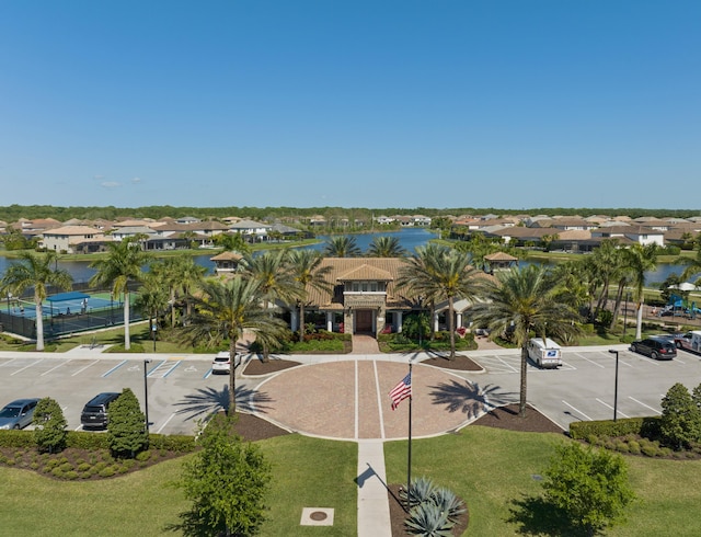 birds eye view of property with a water view