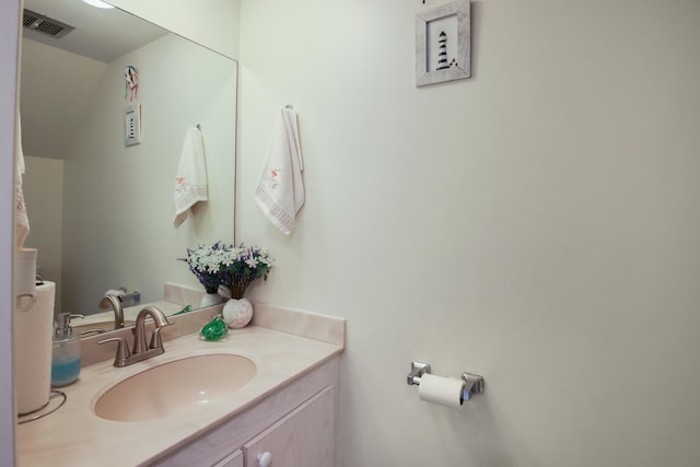 bathroom featuring large vanity