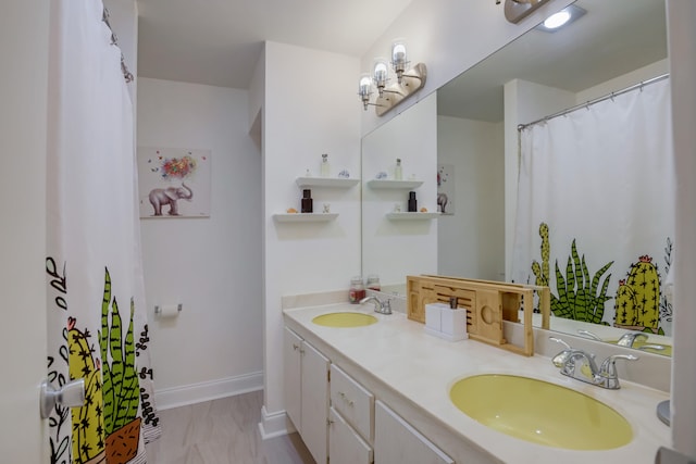 bathroom featuring tile flooring and dual bowl vanity