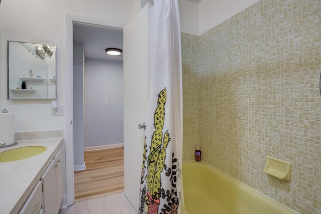 bathroom featuring shower / tub combo with curtain, large vanity, and tile flooring