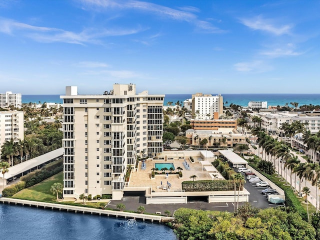 birds eye view of property featuring a water view