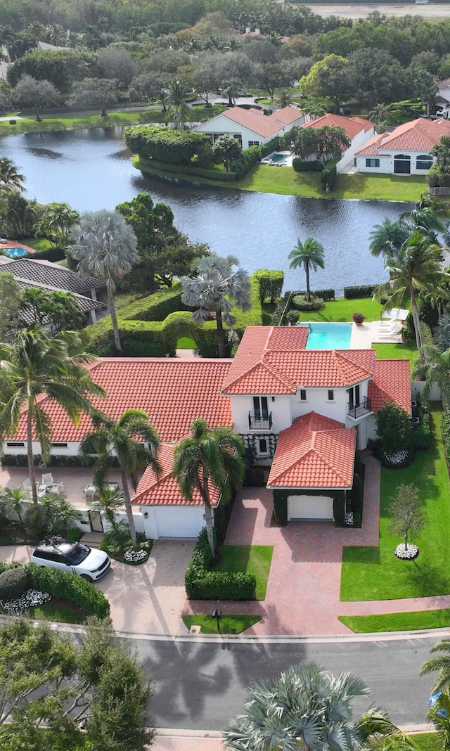 birds eye view of property featuring a water view