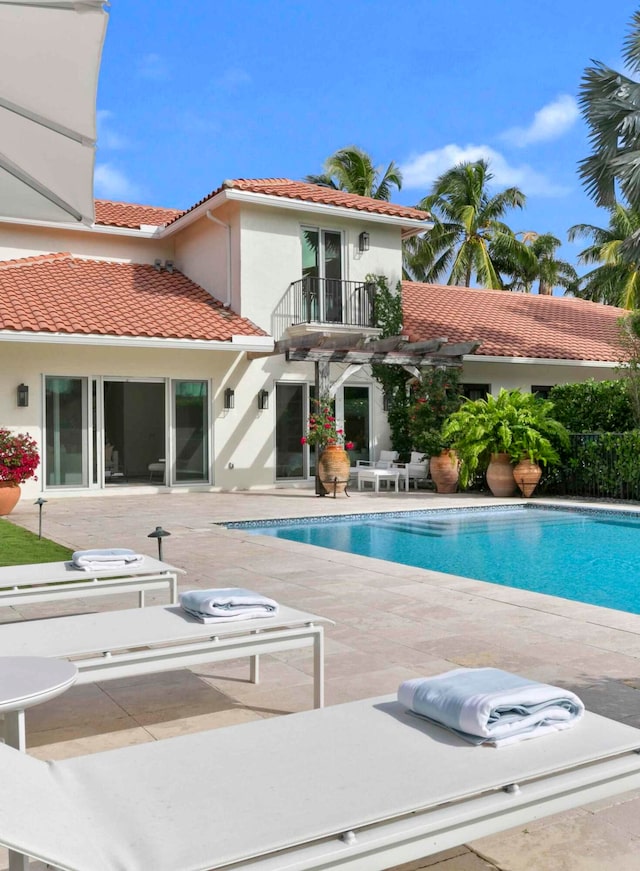 view of swimming pool featuring a patio