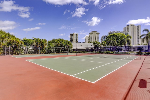 view of tennis court with basketball court