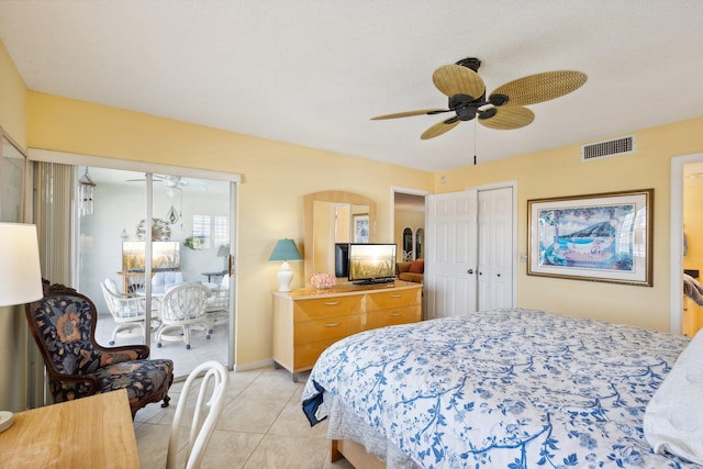 bedroom with light tile patterned floors and ceiling fan